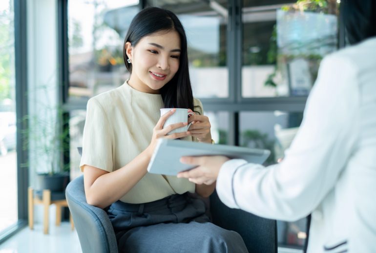 Female CEO and businesswoman meeting to discuss business plan displayed on screen laptop analyze and calculate planning strategies. business success process.